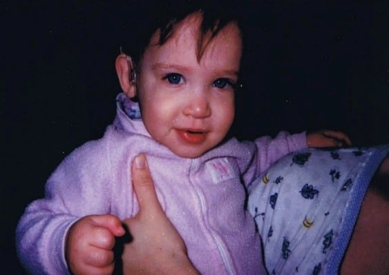 Jacquie, whose parents made the decision for her to hear, as a baby