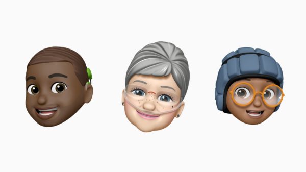 An image of three different Memojis including the new cochlear implant Memoji.